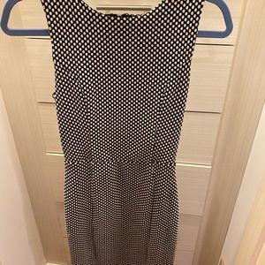 Tight black and white polka dot dress